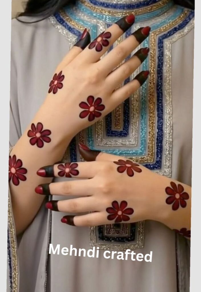 floral backhand Eid mehndi design with shaded flowers and leafy trails