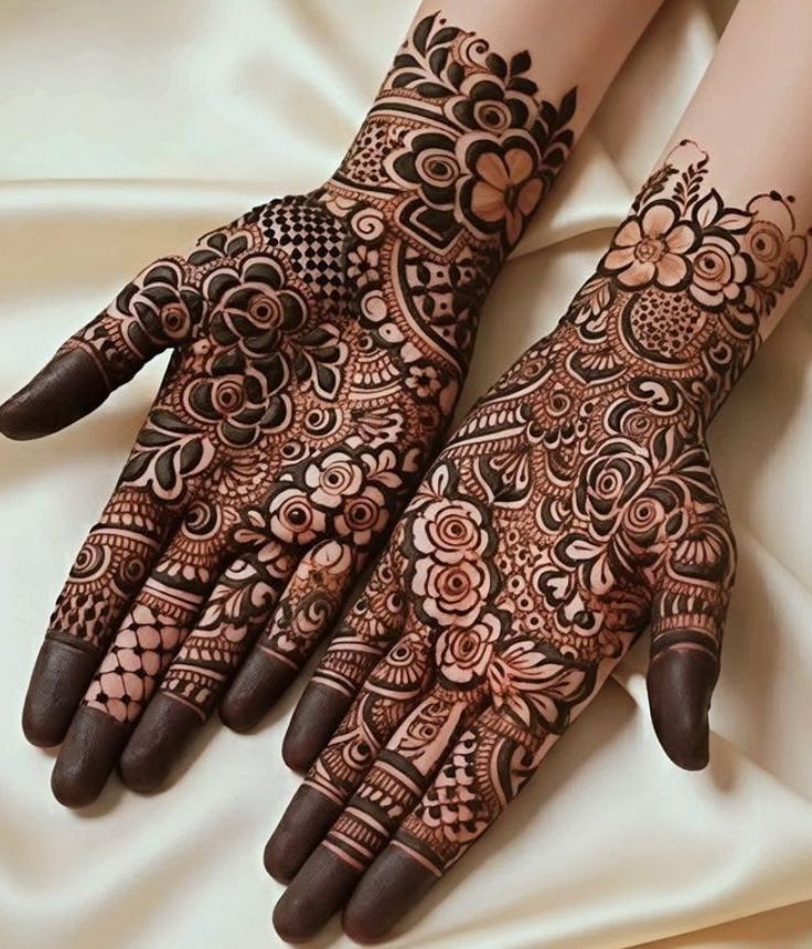 Elegant half-hand mehndi design featuring soft Arabic floral trails and minimalist henna detailing inspired by modern bridal trends 2026