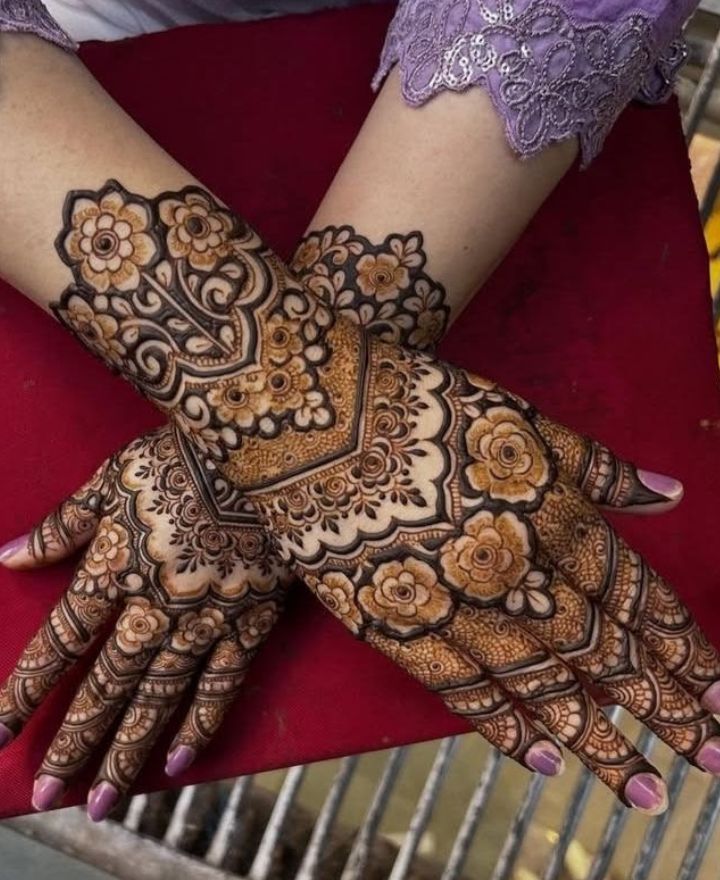 Half-hand bridal mehndi design with minimal floral patterns, clean spacing, and elegant Simple Bridal Mehndi Designs 2026 style for modern brides