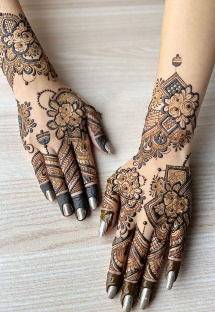 Indo-Arabic bridal mehndi design combining traditional Indian intricate patterns with bold Arabic floral vines, elegant full-hand henna coverage, detailed bridal style artwork with modern 2026 aesthetic.