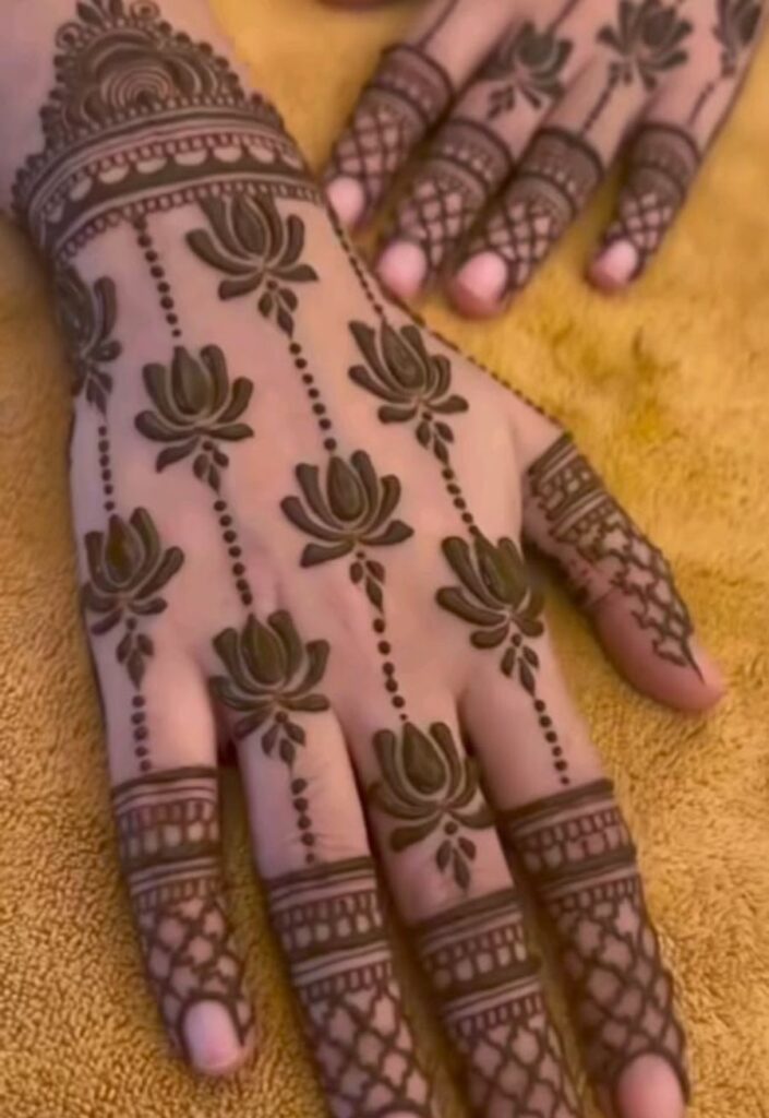 Negative space lotus mehndi design 2026 with modern net style gaps and floral kamal detailing for stylish look