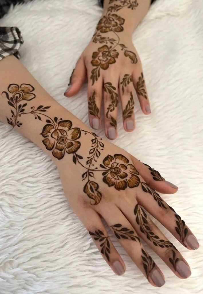 Rose vine bridal mehndi featuring floral trails and elegant modern henna detailing