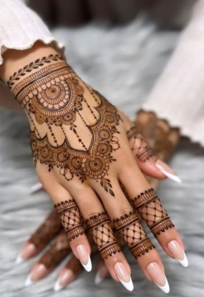 Royal Indo-Arabic mehrab mehndi design with bold floral trails, detailed arches, and luxurious bridal henna artwork