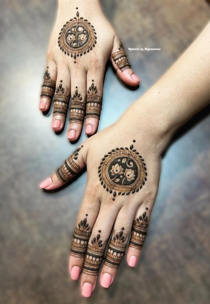 Festival special circular mehndi design featuring a bold central mandala with intricate floral and paisley patterns radiating outward, creating a traditional festive palm decoration style.