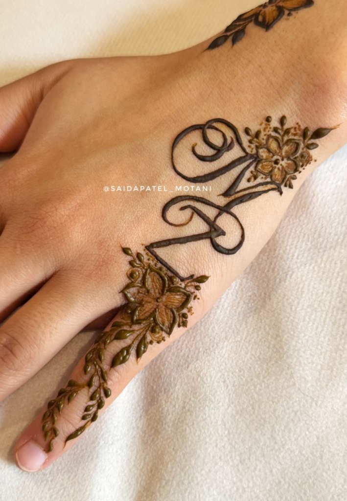 Minimal finger initials simple name mehndi design 2026 modern style
