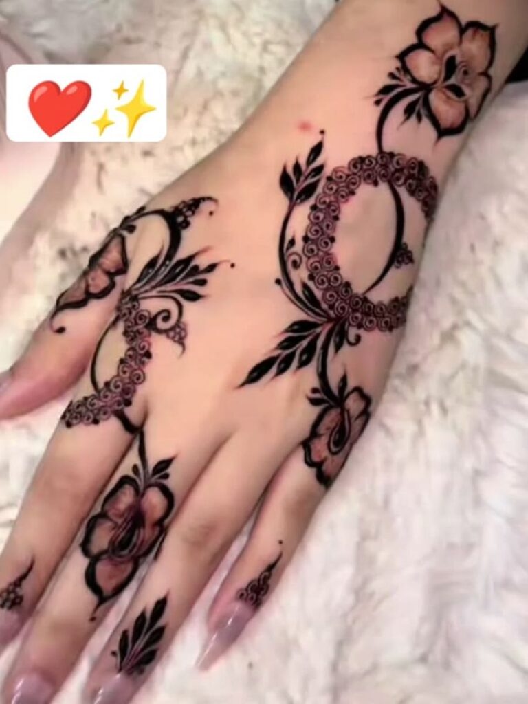 Arabic College Girl Mehndi Designs with bold flowers and flowing vine patterns