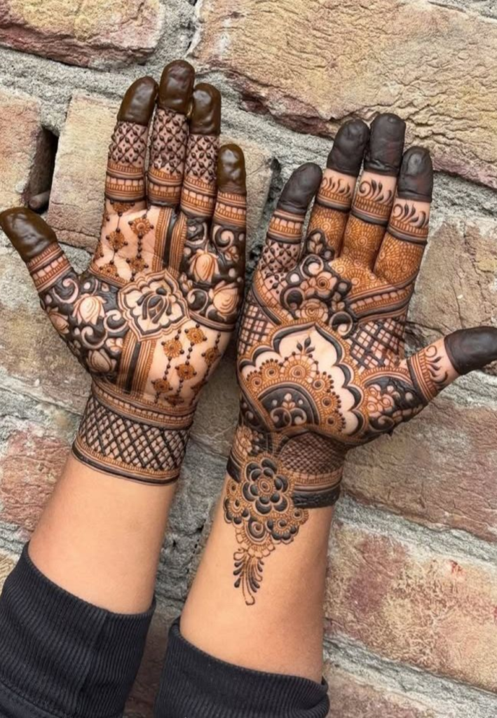 Arabic Karwa Chauth mehndi designs with bold floral vines and elegant flowing henna patterns on hands for a stylish festive look.