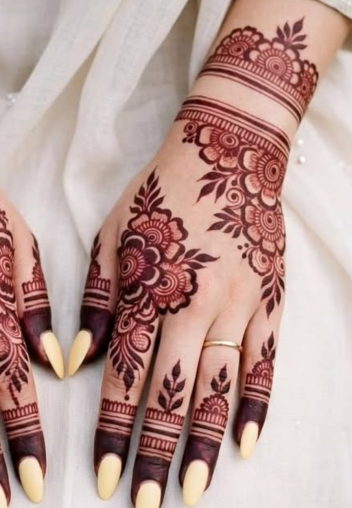 Floral Karwa Chauth mehndi designs featuring beautiful flower patterns and leafy vines on hands for a traditional festive look.