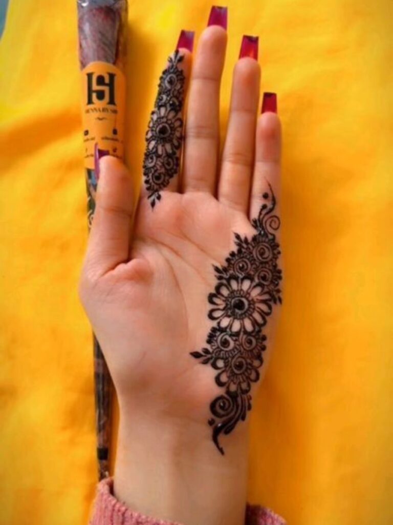 Beautiful front hand College Girl Mehndi Designs with stylish floral henna patterns