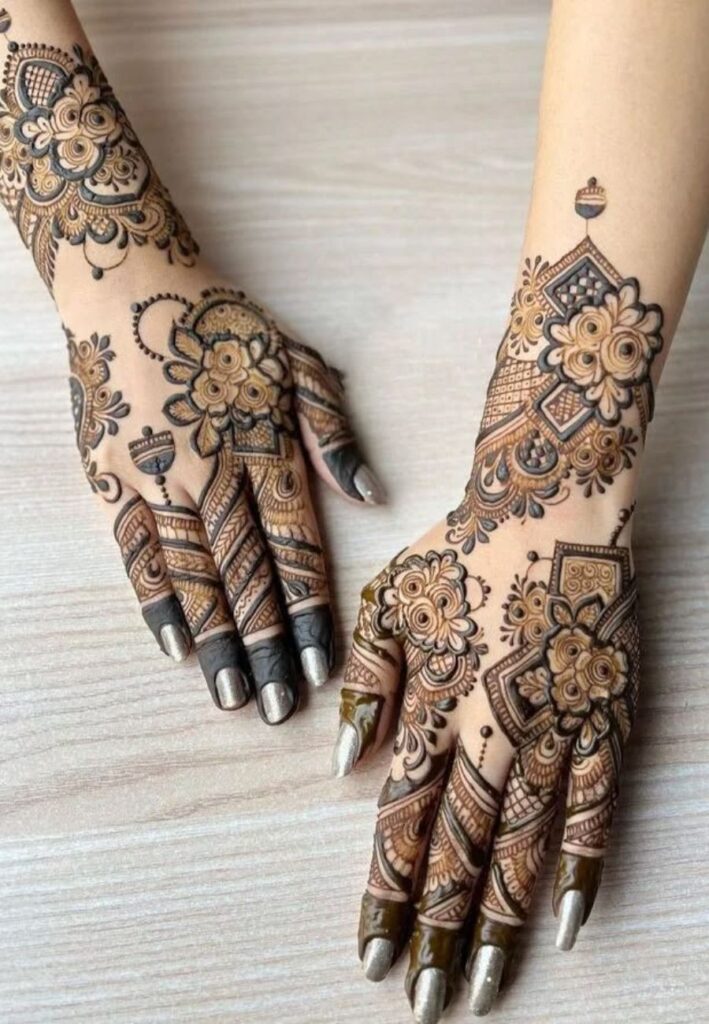 Full hand Moroccan mehndi design with detailed geometric patterns, traditional motifs, and elegant henna coverage.