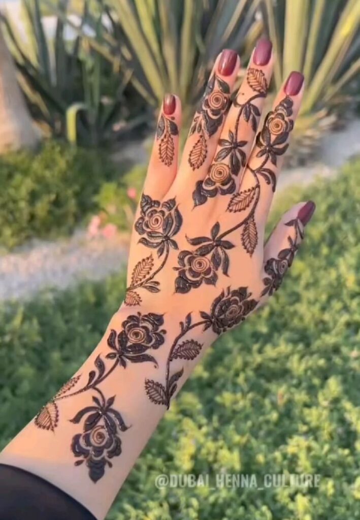 Full-Hand Rose Mehndi Designs featuring detailed floral henna artwork.