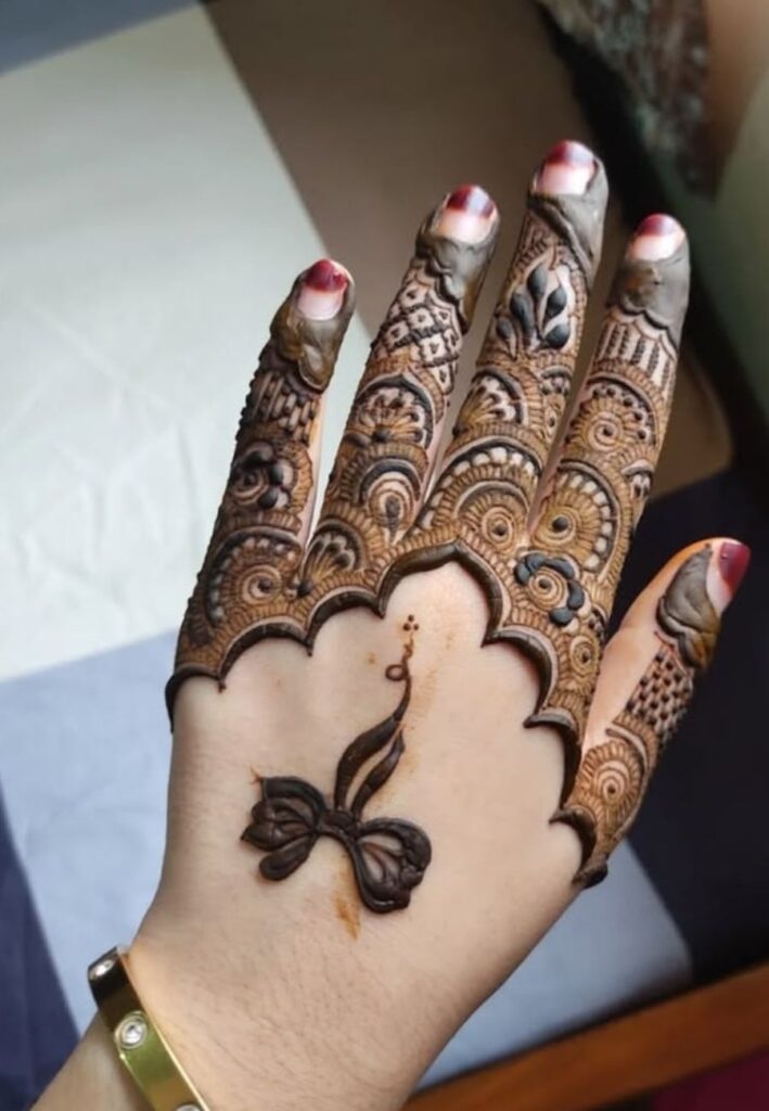 Half Hand Minimal Mehndi Designs 2026 featuring elegant floral patterns, negative space, and modern Gen Z henna style
