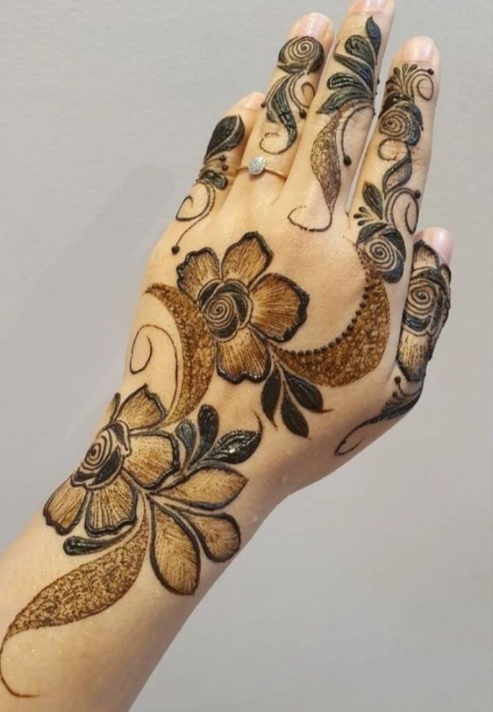 Moroccan floral fusion mehndi design featuring traditional geometric patterns combined with delicate flower motifs.