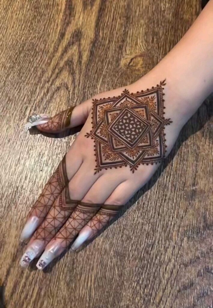 Moroccan geometric grid mehndi design featuring symmetrical lines, diamond patterns, and detailed henna artwork.