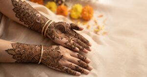 Elegant Peacock Mehndi Designs featuring intricate peacock feathers, floral patterns, and bridal henna artwork on hands