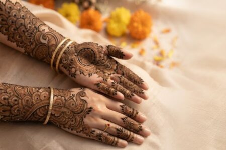 Elegant Peacock Mehndi Designs featuring intricate peacock feathers, floral patterns, and bridal henna artwork on hands