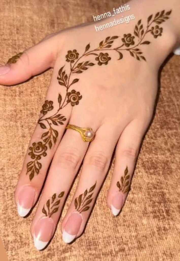 Single finger floral henna design