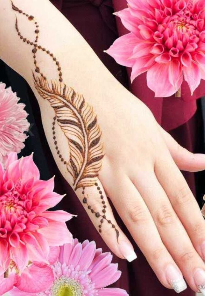 Tiny feather henna design