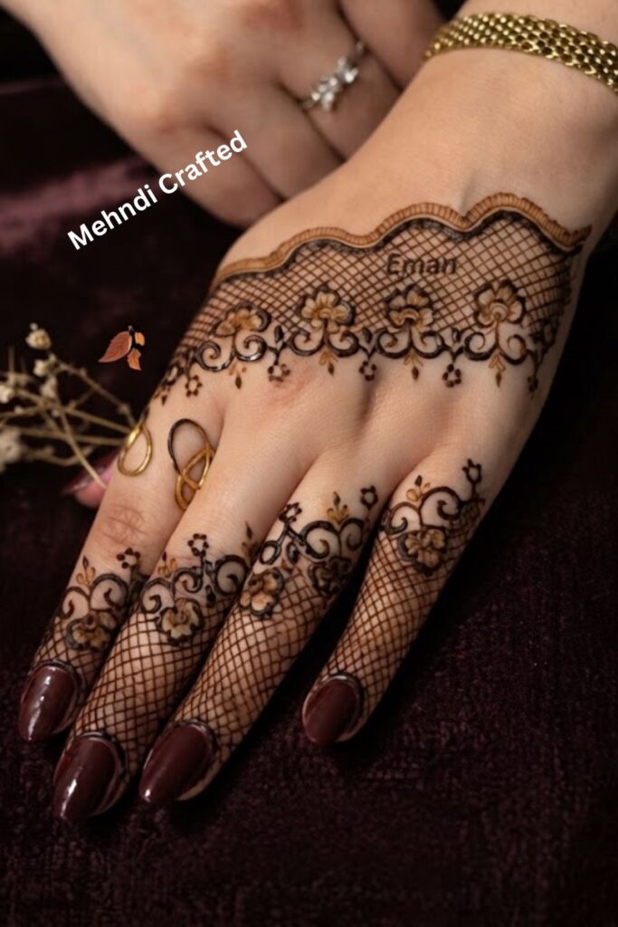 Back-hand grid mehndi design with geometric squares and delicate fine-line details