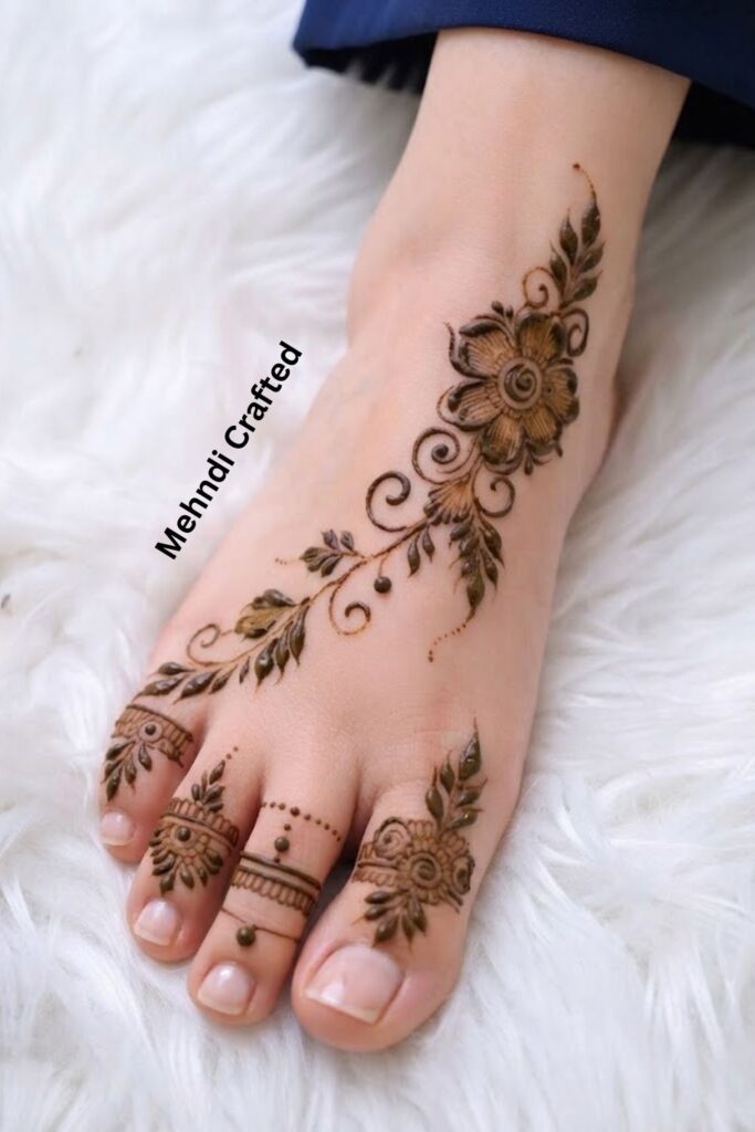 Minimal Arabic-inspired foot mehndi with floral vine